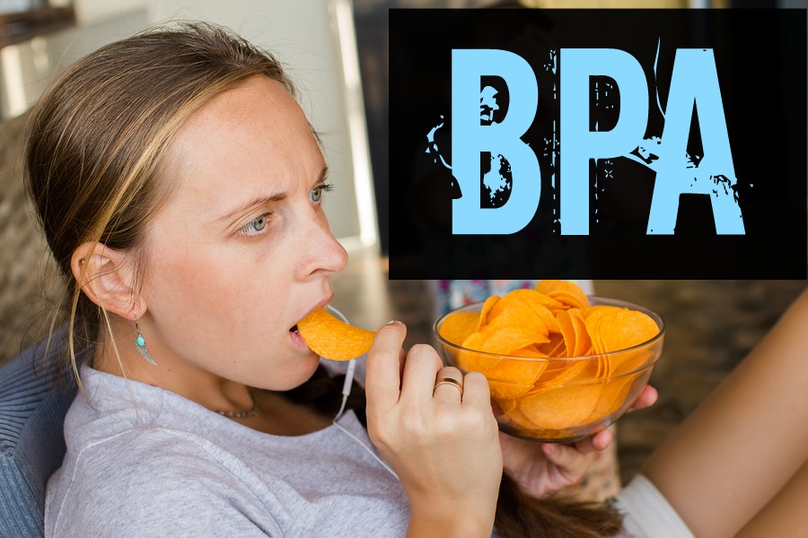 Woman works at the computer and eating fast food. Unhealthy Lifestyle Woman works at the computer and eating fast food. Unhealthy Lifestyle