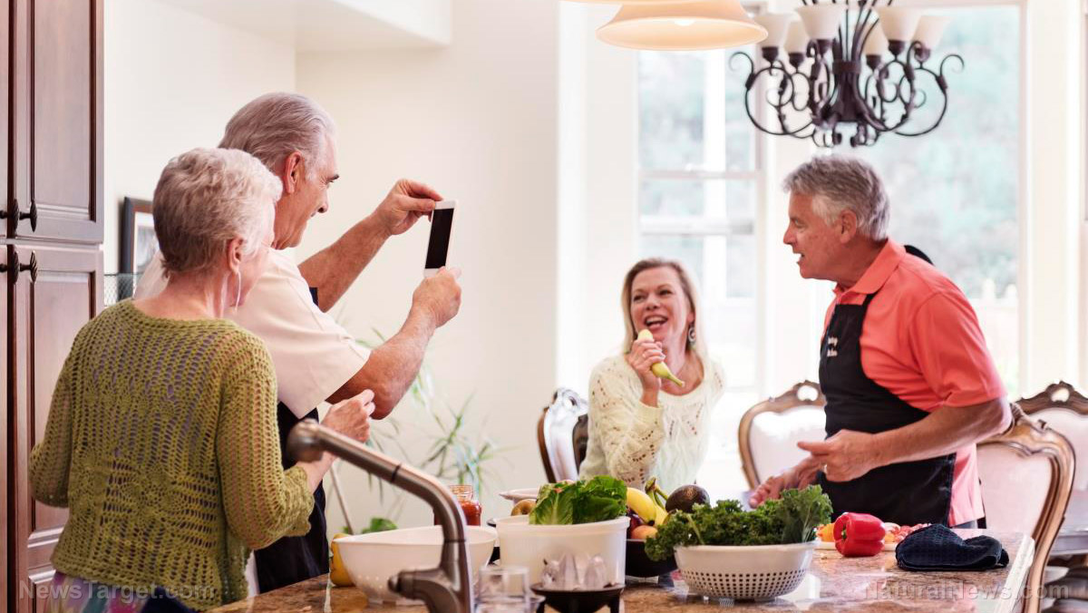 Elderly-Friends-Dinner-Party-Singing-Fun